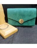 Women's green clutch