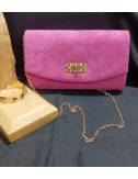 Women's fuchsia clutch